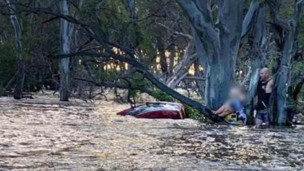 Mitch Smith saves 74-year-old woman from floodwaters. Picture Nine